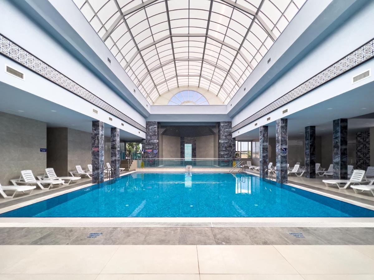 Karahayit  Spa Hotel Colossae Thermal מראה חיצוני תמונה The pool at the hotel